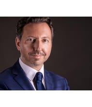Laurent MERENGONE, Direttore